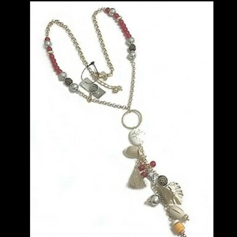 Chico’s long Kira gold tone charm necklace